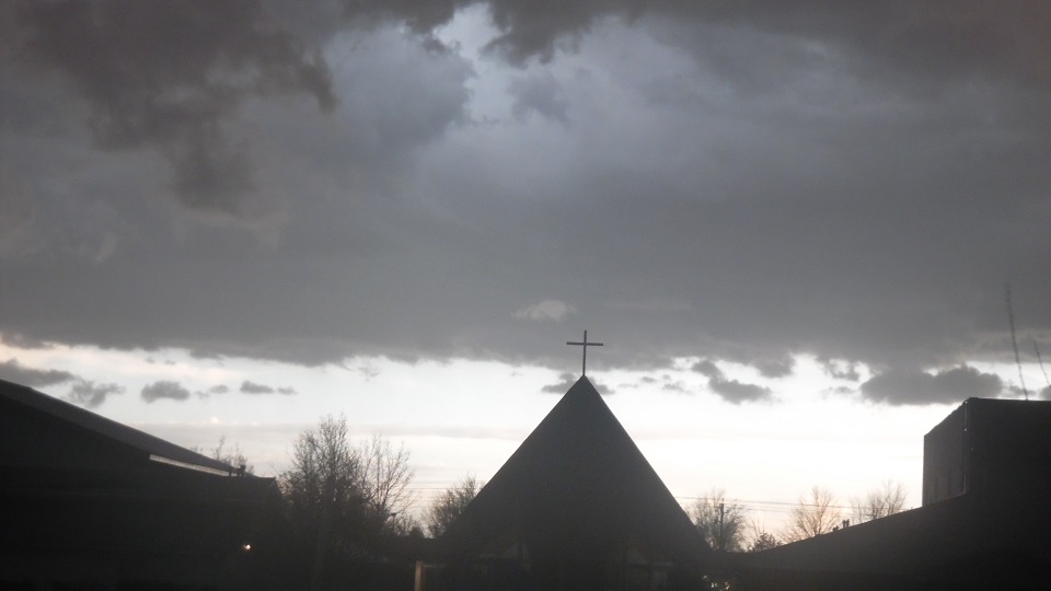 A nearby church building during the storm